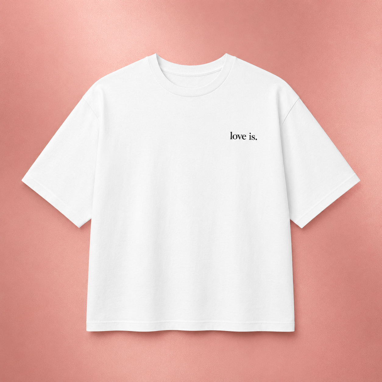 White oversized cotton t-shirt with minimalist love is. logo on the left chest, Christian streetwear apparel.